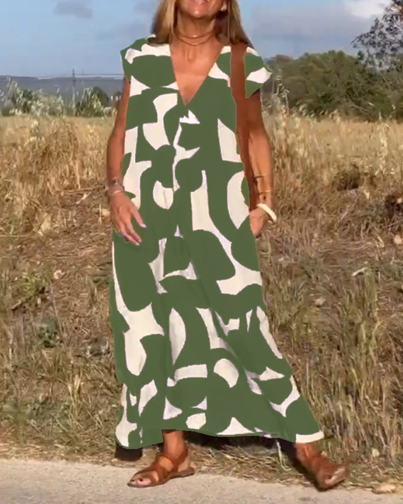 NAOMI | Lang kjole med V-hals og utsvingt kant for et høytidslook